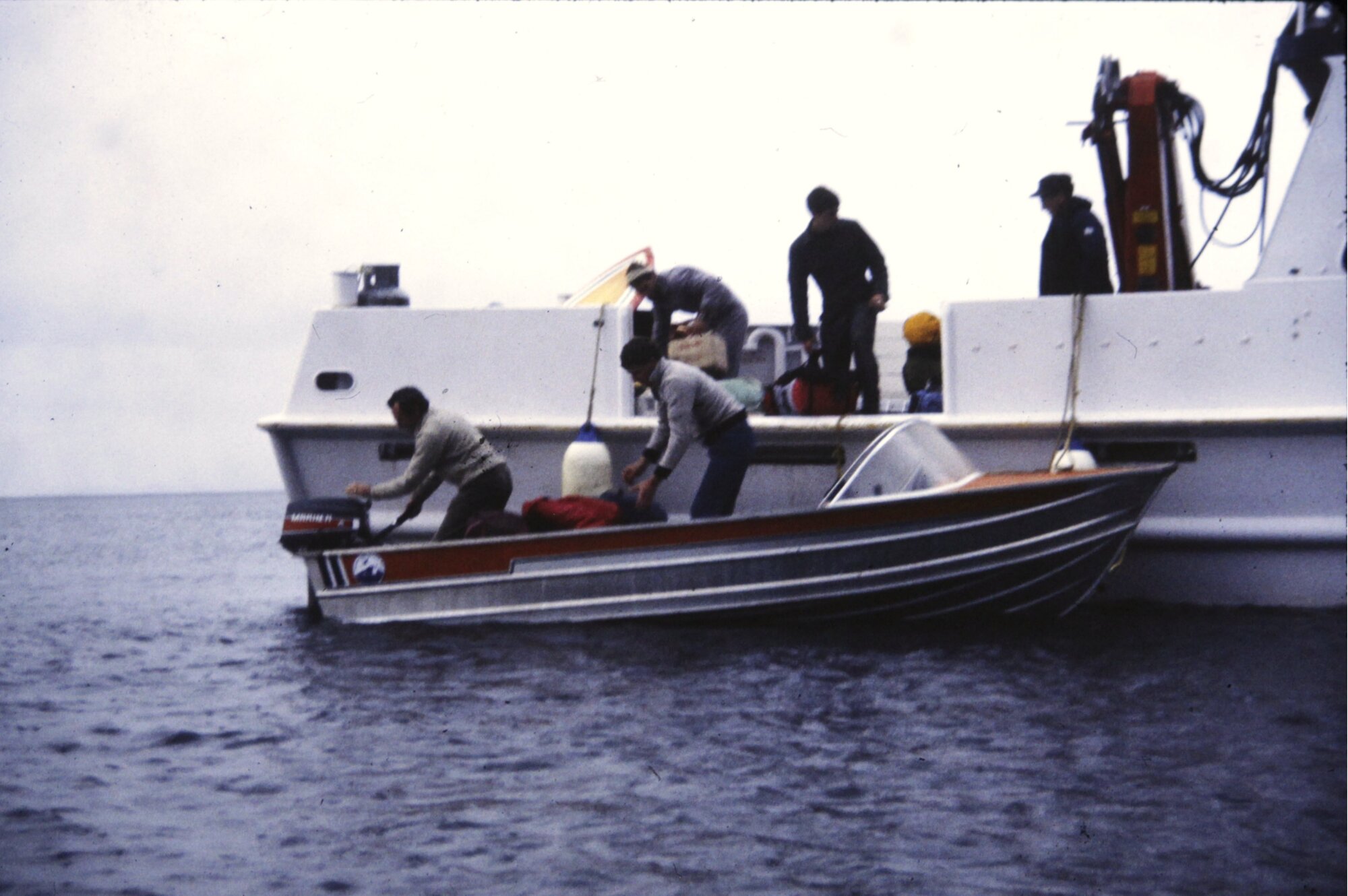 Loading dinghy at Little Barrier