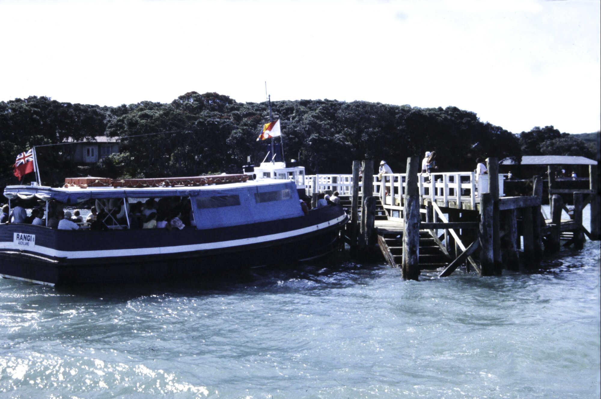 Blue Boat using the wharf to bow-load passengers