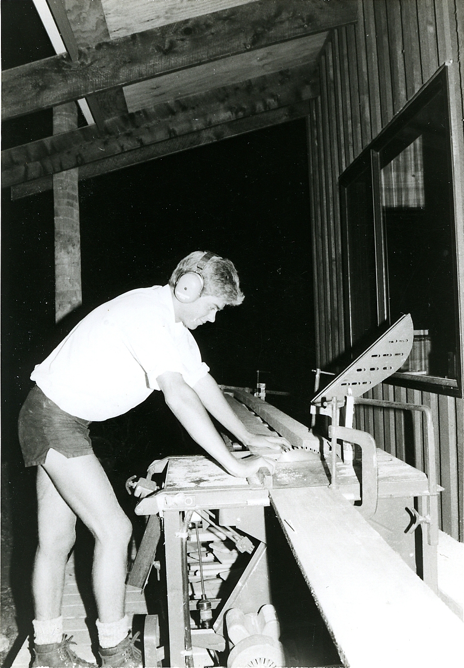 Trimming lining boards for the interior of Waingongoro Hut 1986