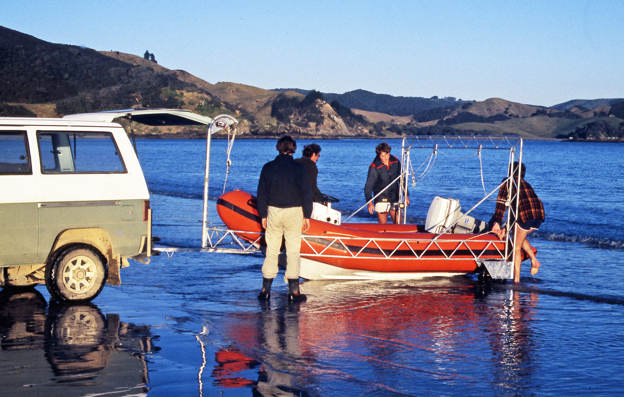 Launching the RHIB at Mimiwhangata 1986