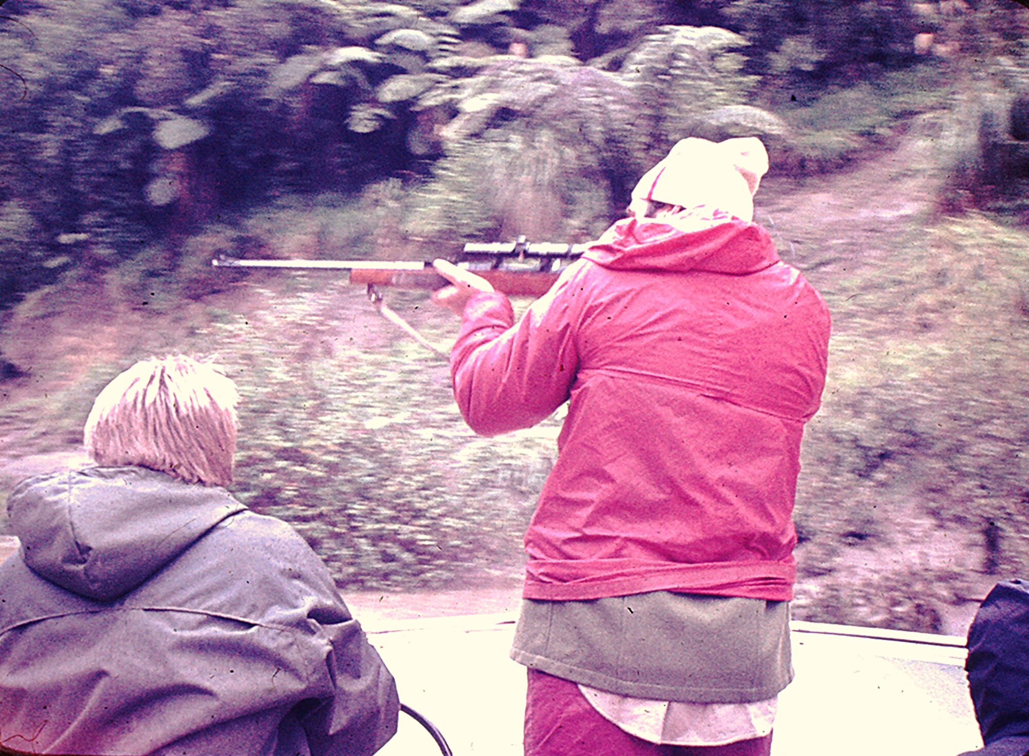 Bruce Jefferies showing relieving rangers how to shoots goats Whanganui River 1976