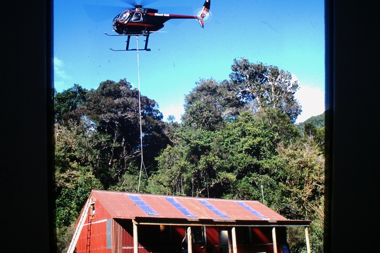 Helicopter loading materials to Locke Stream Hut 1993