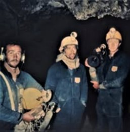 Left: Merv Aitchison, Sir Ian Taylor and Paul Donovan Filming in Nettlebed Cave. 
 Credits: Nettlebed Expedition