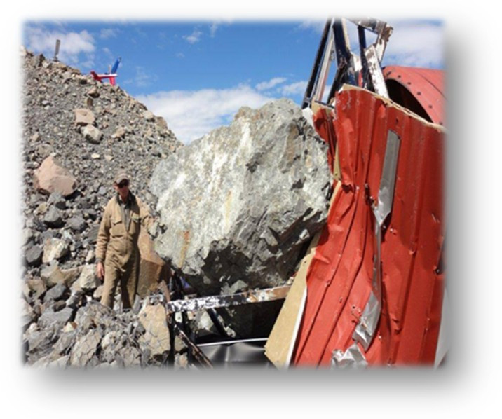 The huge boulder that hit the rear of Gardiner Hut. Photo: DOC