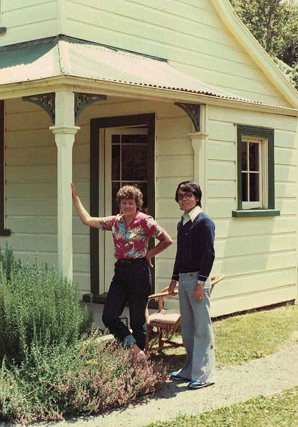 At the Colonial House, Kathy chats with Mulyadi, a trainee ranger visiting from Indonesia.