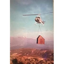Helicoptering a toilet into a hut. Possibly Oturere hut, Tongariro National Park