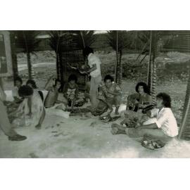 Togitogina staff celebrate the completion of the Fale