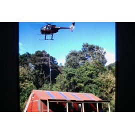 Helicopter loading materials to Locke Stream Hut 1993