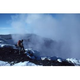 Bruce Jefferies looking into Ngauruhoe’s crater: Tongariro National Park