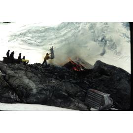 Murchison Hut being burnt down: Aoraki Mount Cook National Park