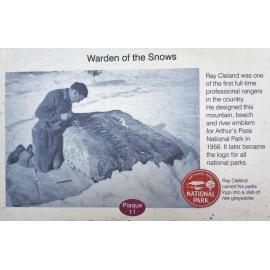 Ray Cleland carving to Arthur's Pass sign