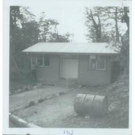Painting a cabin: Tongariro National Park 1963