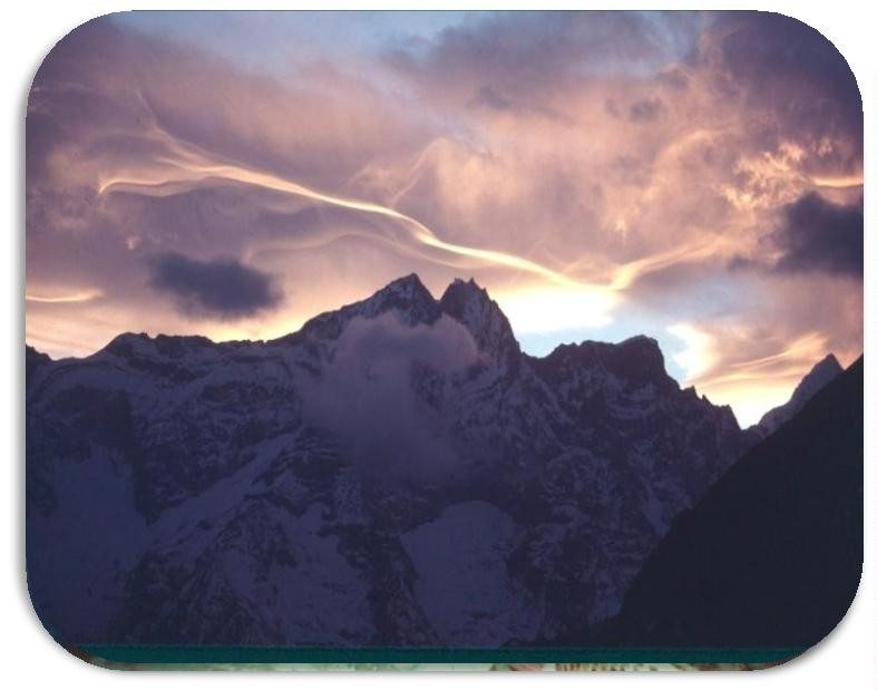 Sunset clouds over the summit peaks of Kwande, 6,011 m