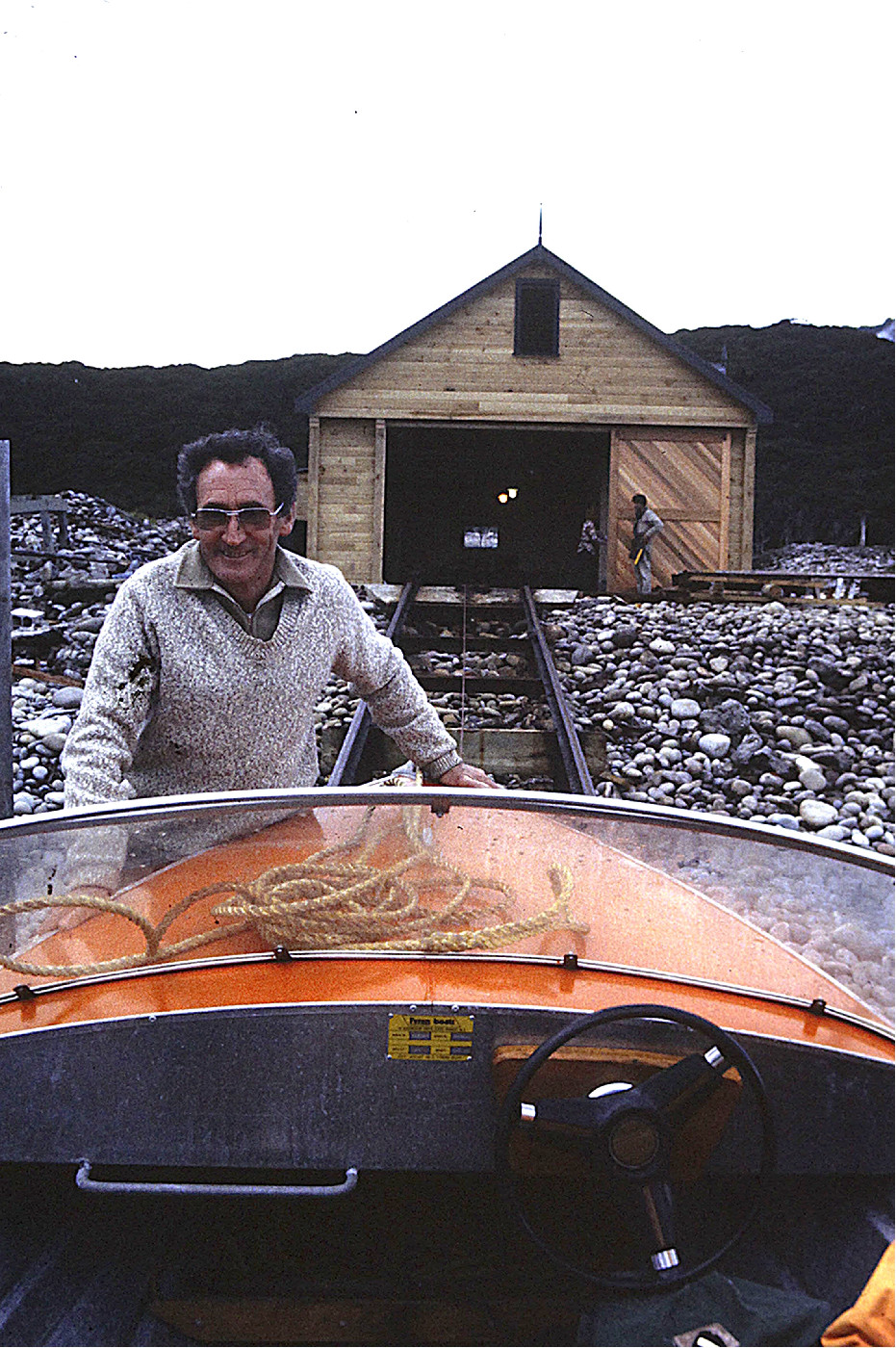 Mike and Alex Dobbins on the veranda of their house on Little Barrier Island